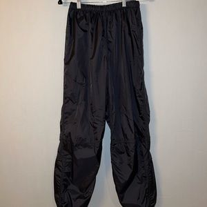 “Pocket Pack” black windbreaker vintage 90s dance pants